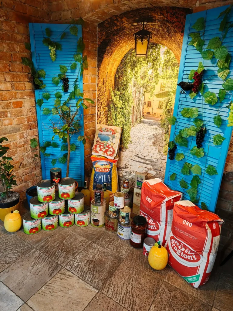 Zapasy włoskich pomidorów Strianese i mąki do pizzy w Restauracja O Sole Mio Italiano w Toruniu.